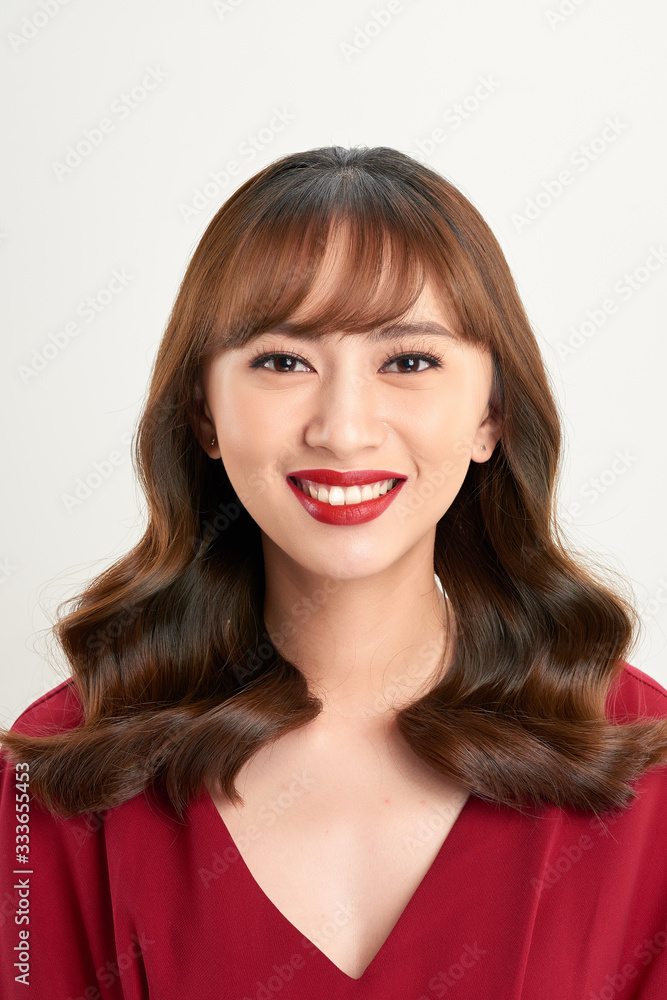 Young beautiful Asian woman with smiley face and red lips Young beautiful Asian woman with smiley face and red lips