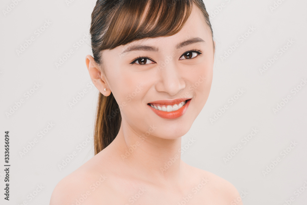 Pretty smiling joyfully asian teenager female dressed casually, looking with satisfaction at camera Pretty smiling joyfully asian teenager female dressed casually, looking with satisfaction at camera