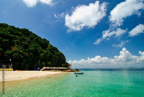 beauty in nature  Kapas Island located in Terengganu  Malaysia under bright sunny day and cloudy sky