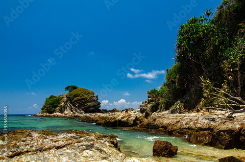 beauty in nature, Kapas Island located in Terengganu, Malaysia under bright sunny day and cloudy sky photo