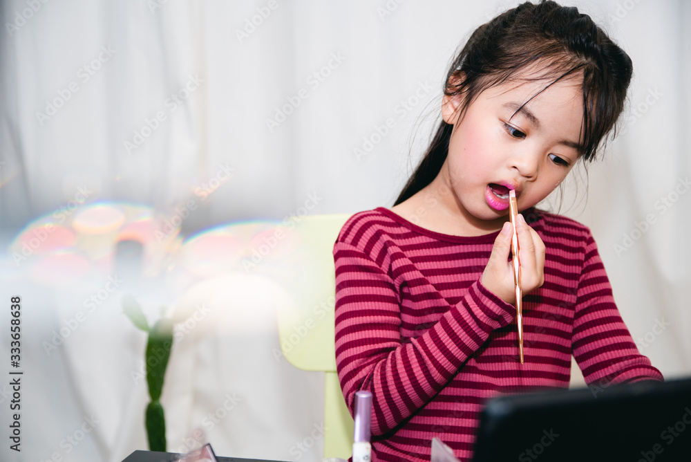 Asian Child Make up Beauty blogger showing how to make up Video Tablet , Happy Asian girl vlogger recording video Asian Child Make up Beauty blogger showing how to make up Video Tablet , Happy Asian girl vlogger recording video