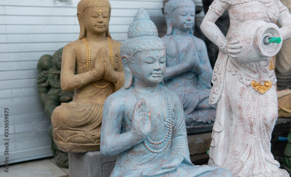 .statues of indonesian gods, hindu deities. Travel souvenirs in the form of statues of deities
