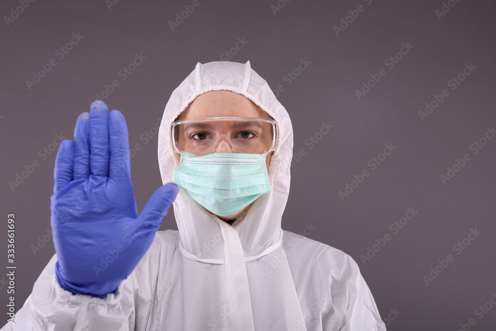 Woman in protective costume. Stop pandemic Woman in protective costume. Stop pandemic
