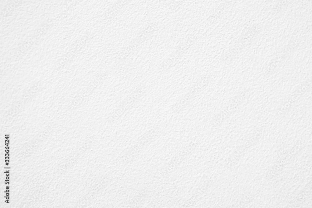 White concrete stone wall texture background. White concrete stone wall texture background.