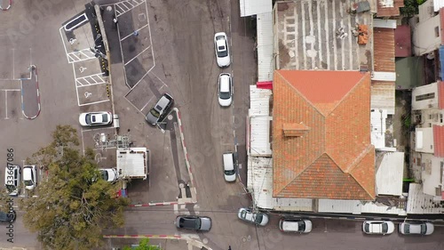 Corona Virus days, Empty street and closed shops at of Haifa Talpiot food market, Aerial view. photo