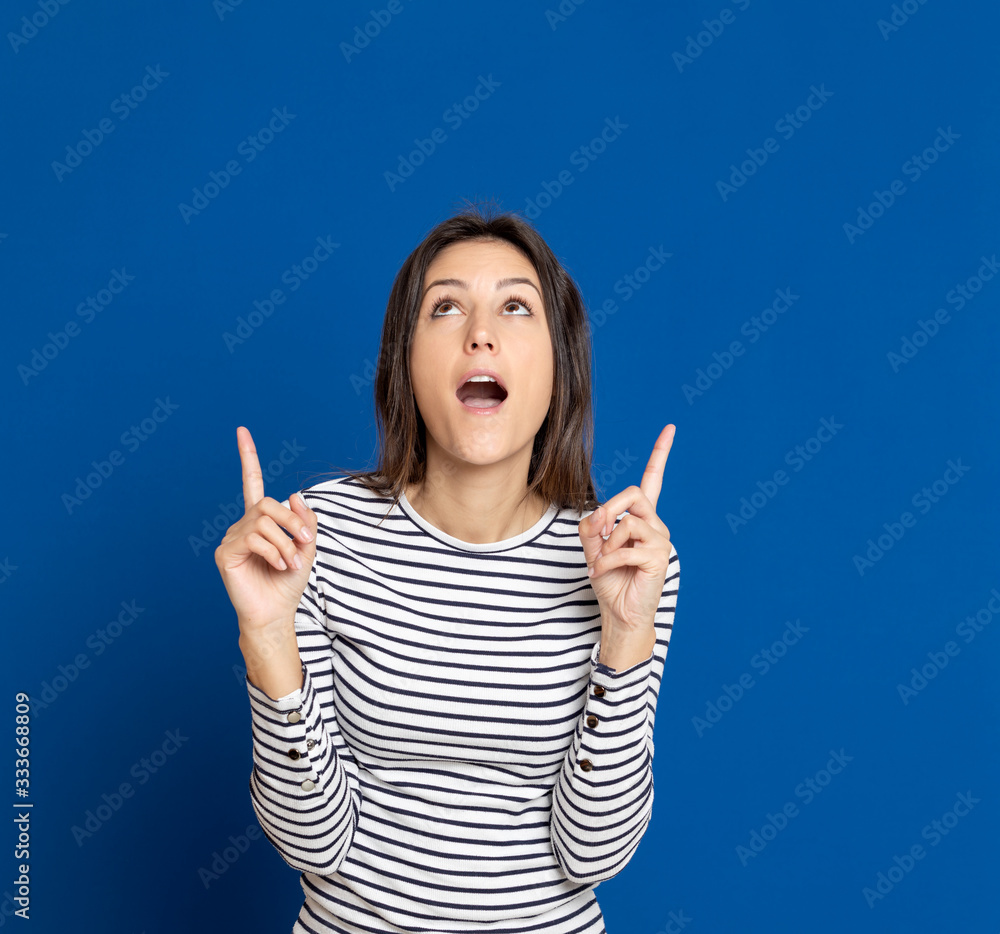 Brunette young woman wearing a striped T-shirt Brunette young woman wearing a striped T-shirt