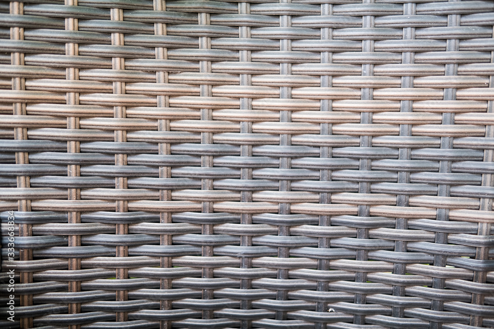 Synthetic rattan texture weaving background black Synthetic rattan texture weaving background black