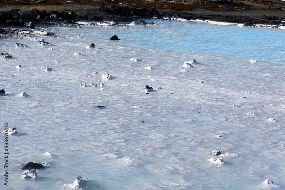 Fototapeta premium clear water sky blue colors on a lava field. The blue Lagoon in Iceland