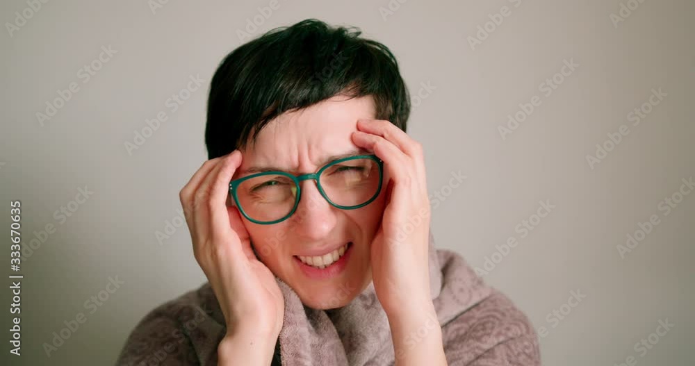 Woman feeling afraid stressed face thinking of disease or problems having strong headache. Woman feeling afraid stressed face thinking of disease or problems having strong headache.
