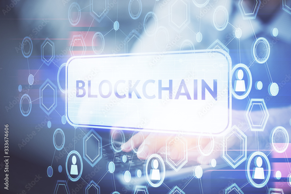 Crypto currency theme hologram with businessman working on computer on background. Concept of blockchain. Double exposure. Crypto currency theme hologram with businessman working on computer on background. Concept of blockchain. Double exposure.