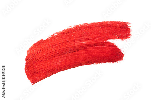 Lipstick swatch smudge smear isolated on white background. Cream makeup texture. Red color cosmetic product brush stroke swipe sample