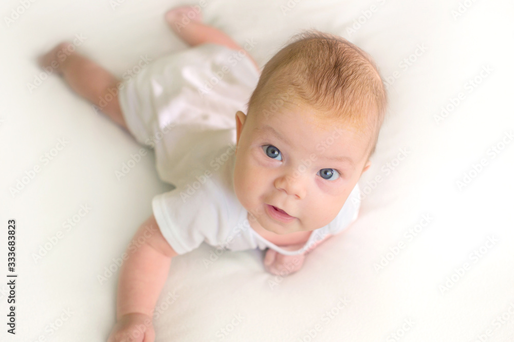 Cute adorable baby child. Happy baby girl on white background and looking at the camera. Cute adorable baby child. Happy baby girl on white background and looking at the camera.