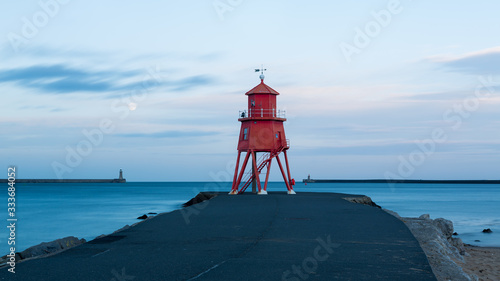 Little Haven Pier at South Shields, Tyneside. On the northeast coast of England, UK. At dusk, during blue hour.