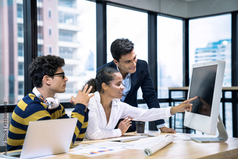 The teamwork of the new generation of business people on the table in the meeting room. The teamwork of the new generation of business people on the table in the meeting room.