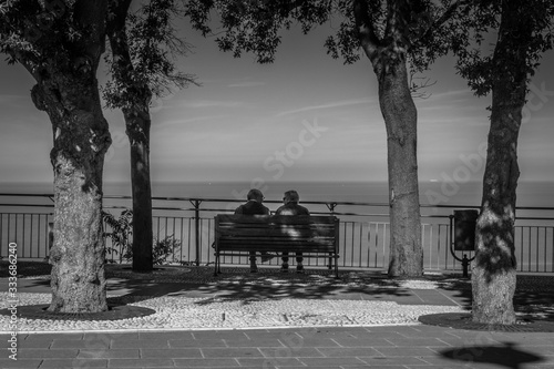 Obraz na płótnie Old couple chat while overlooking the panoramic view of the Adriatic Sea on the Italian Riviera, Sirolo, Italy w salonie