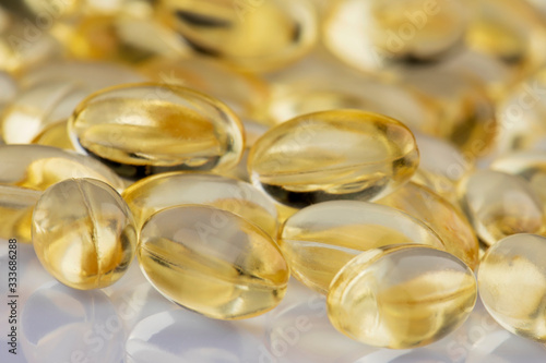 Close up Vitamin E Capsulus on a white background photo