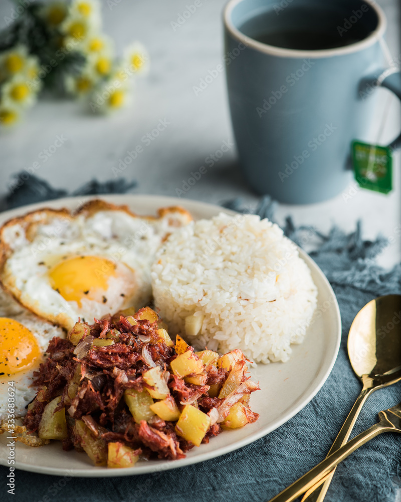 Cornsilog is a famous Filipino breakfast that typically consists of corned beef, fried rice and