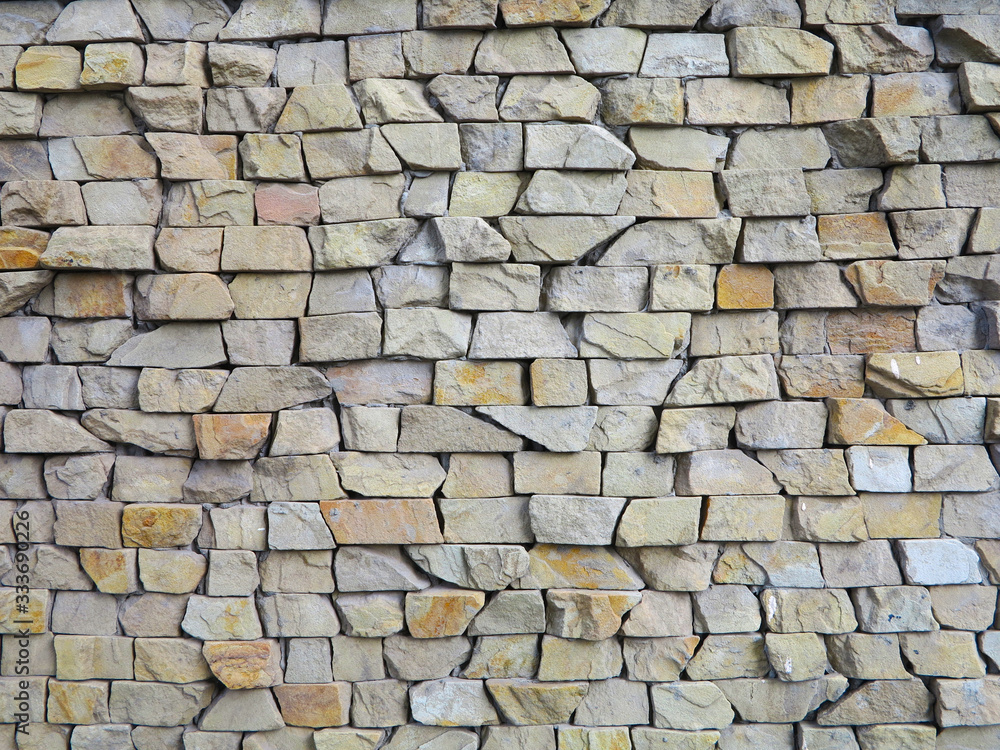 texture of stone on wall of different rocks  