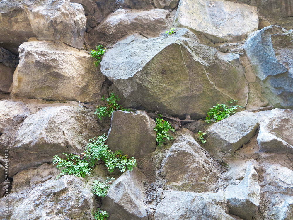 Naklejka premium stone wall and stone texture for background 