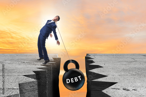 Canvas Print Concept of debt and load with businessman