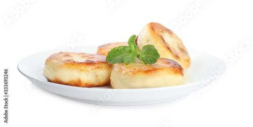 Delicious cottage cheese pancakes with mint isolated on white