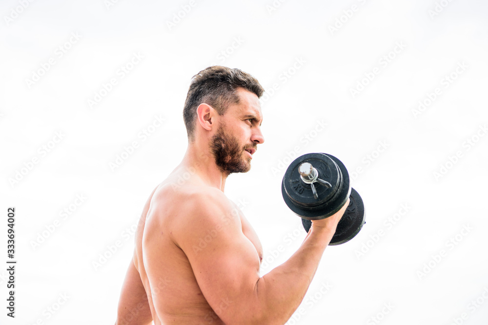 athletic body. Dumbbell gym. Muscular man exercising in morning with barbell. fitness and sport equipment. success. Perfect biceps. man sportsman weightlifting. steroids. Getting into the groove athletic body. Dumbbell gym. Muscular man exercising in morning with barbell. fitness and sport equipment. success. Perfect biceps. man sportsman weightlifting. steroids. Getting into the groove