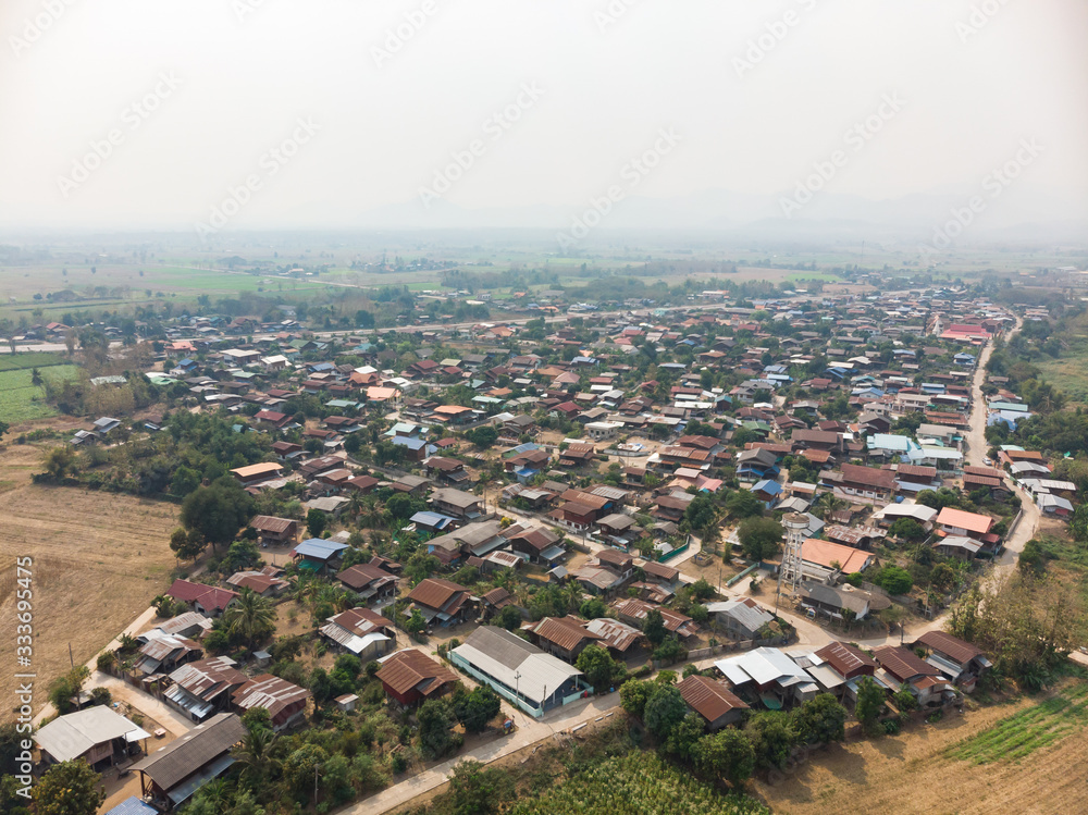 Rural Asian countryside village with smoke pollution problem
