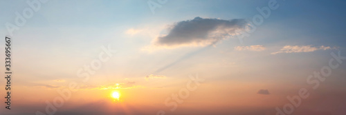 Panorama of Dramatic vibrant color with beautiful cloud of sunrise and sunset. Panoramic image. © tanarch