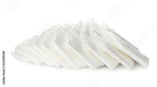 Pile of baby diapers isolated on white