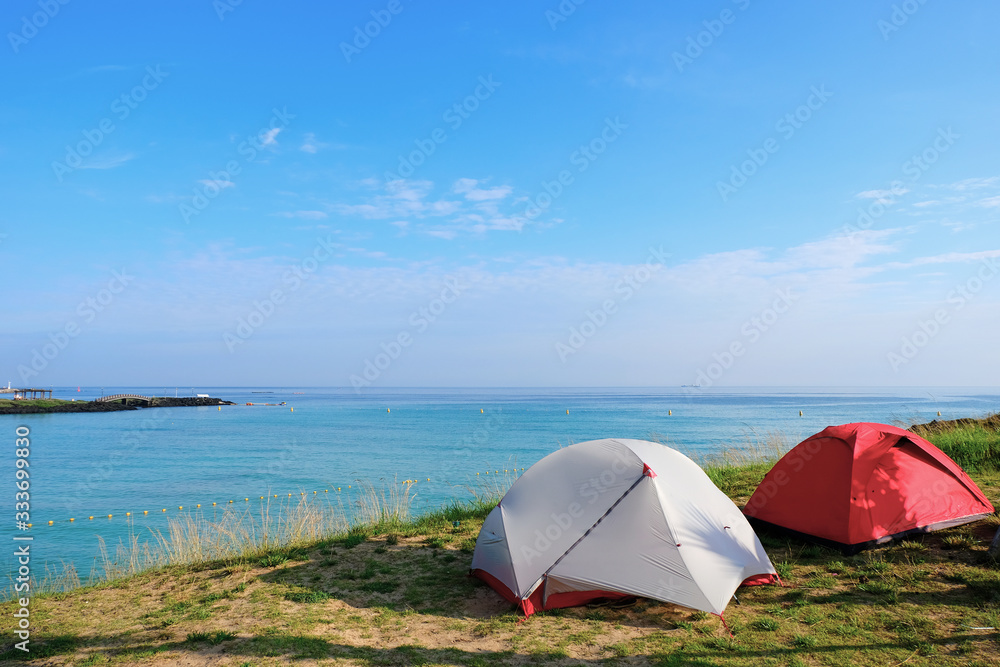 Tent. Hamdeok beach in Jeju Island, South Korea.