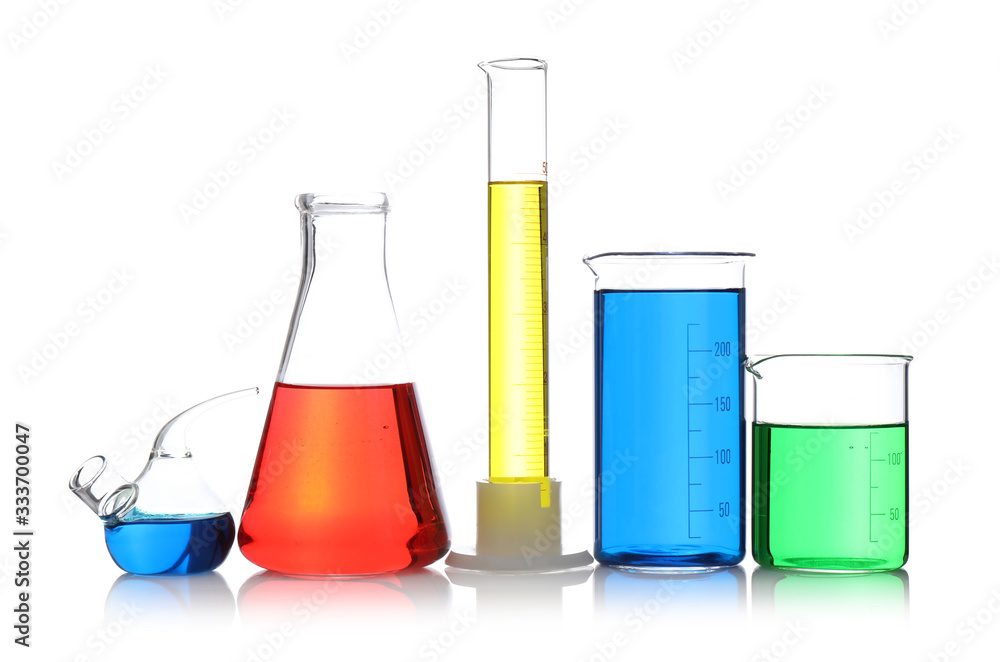 Laboratory glassware with samples on white background