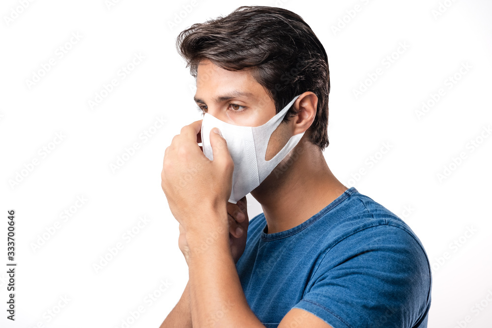 Handsome man brazilian showing okay gesture. Photo of healthy man wears protective mask against infectious diseases and flu. Health care concept.Mask prevent Covid 19 OK Leave space White background Handsome man brazilian showing okay gesture. Photo of healthy man wears protective mask against infectious diseases and flu. Health care concept.Mask prevent Covid 19 OK Leave space White background