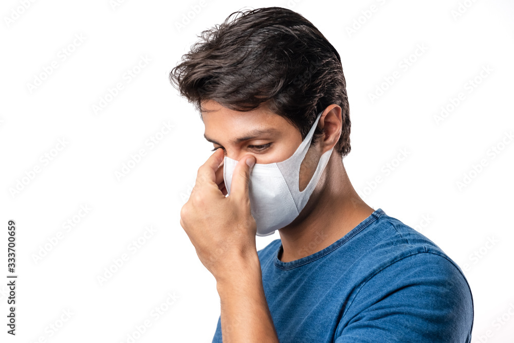 Handsome man brazilian showing okay gesture. Photo of healthy man wears protective mask against infectious diseases and flu. Health care concept.Mask prevent Covid 19 OK Leave space White background Handsome man brazilian showing okay gesture. Photo of healthy man wears protective mask against infectious diseases and flu. Health care concept.Mask prevent Covid 19 OK Leave space White background