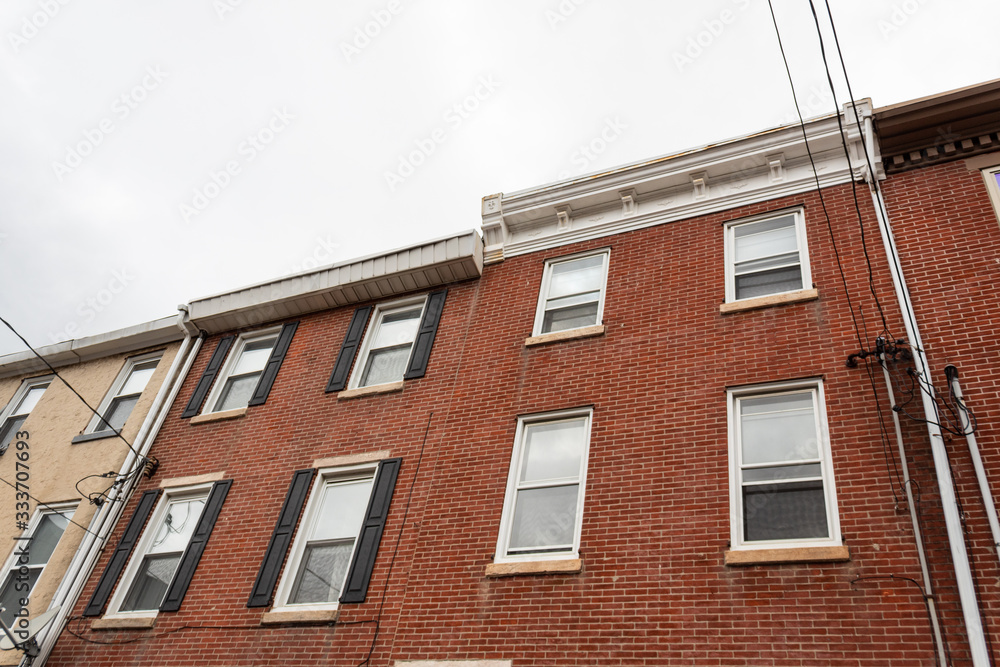 View up the face of mixed inner city housing in different styles, horizontal aspect View up the face of mixed inner city housing in different styles, horizontal aspect