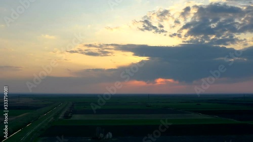 Wallpaper Mural drone  hyper lapse of agricultural fields and moving clouds in sky and beautiful sunset Torontodigital.ca