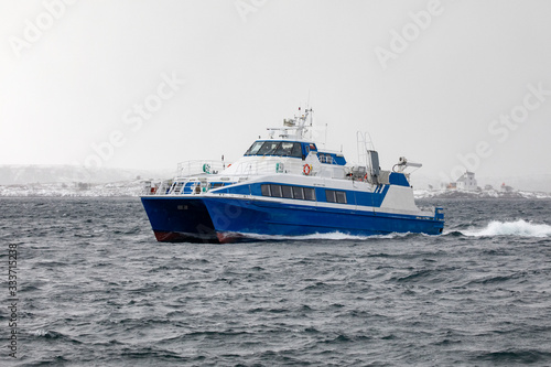 Fast speed passenger boat arrives in Brønnøysund in northern Norway