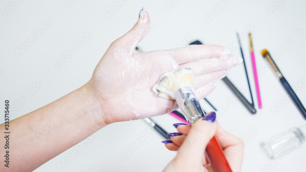 Cleaning and care of makeup brushes, women's hands wash the brush from cosmetics, Cleaning and care of makeup brushes, women's hands wash the brush from cosmetics,