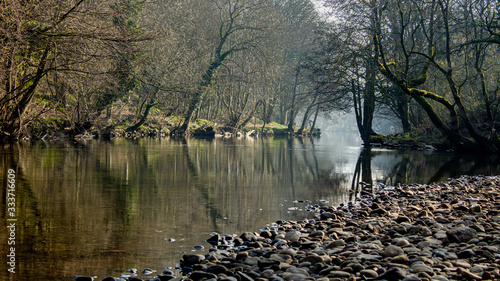 The tranquil River Aire makes its way through Hirst Wood in Shipley providing residents and visitors with a peaceful way to relax and recharge their batteries photo