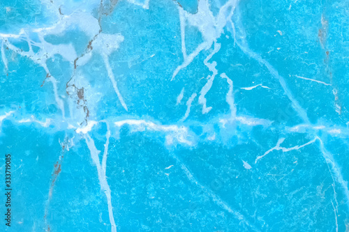 Abstract blue and cyan paint on a surface, texture art background.