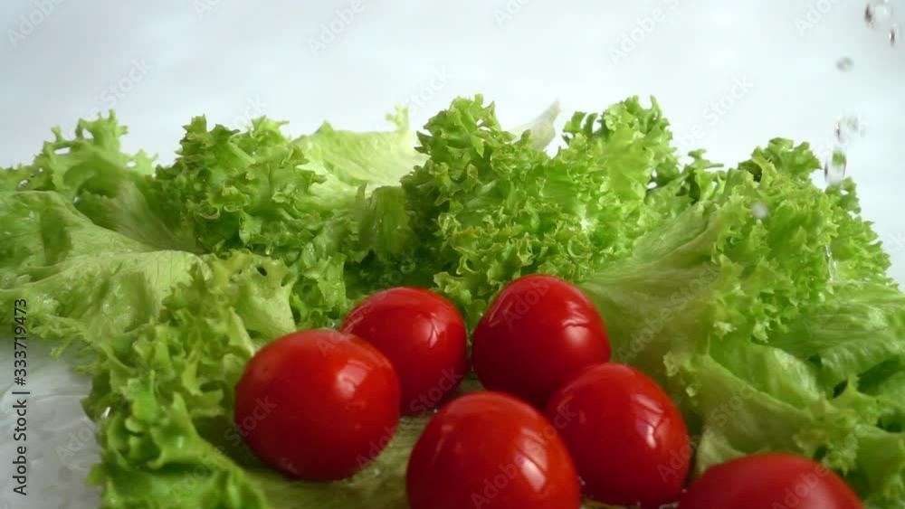 Washing of lettuce leaves. Slow motion. Washing of lettuce leaves. Slow motion.