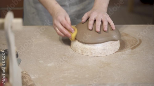 Woman moisturizing clay