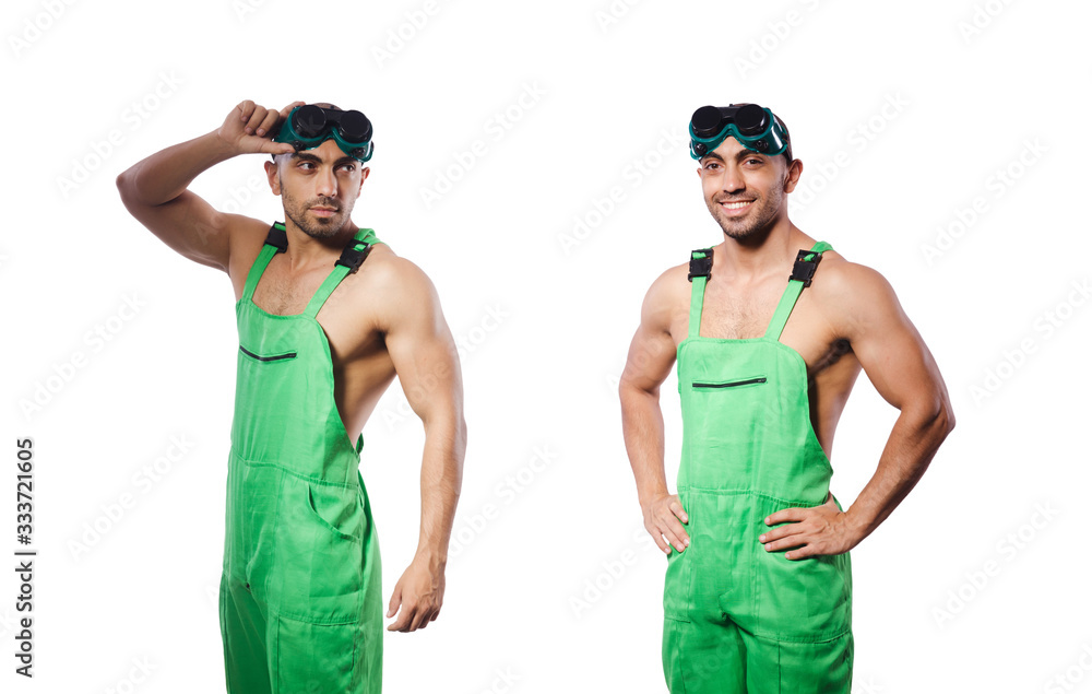 Man in green coveralls with goggles Man in green coveralls with goggles