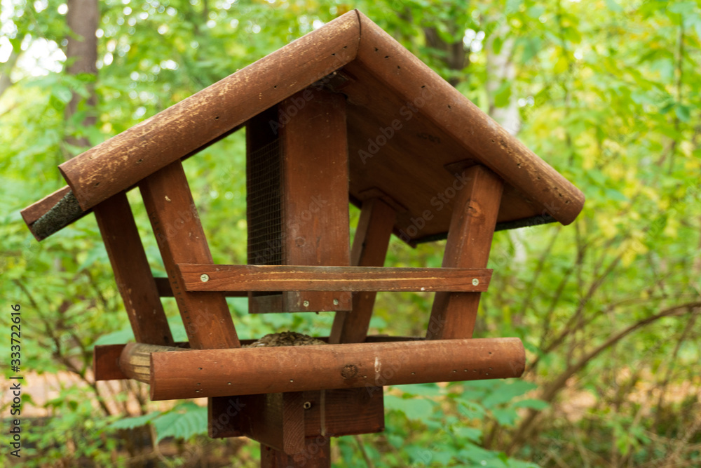 Close-up of a wooden empty bird house Close-up of a wooden empty bird house