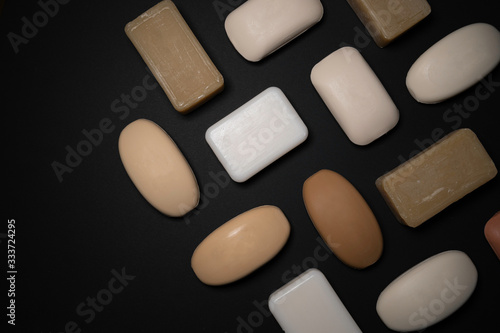 Close up of soap bars on black background (ID: 333724295)