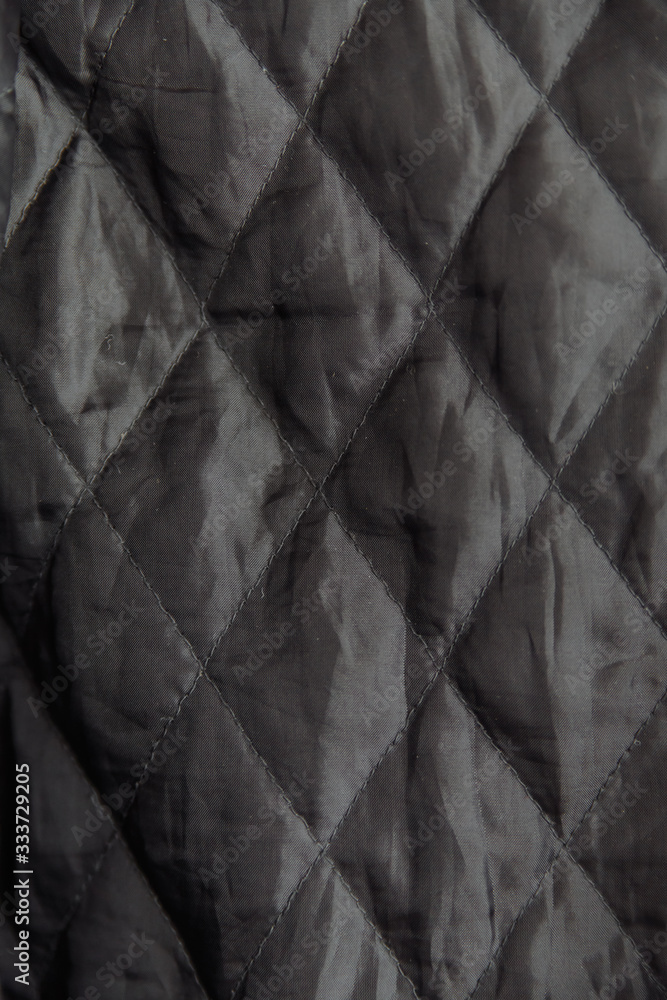 black quilted fabric close up macro black quilted fabric close up macro