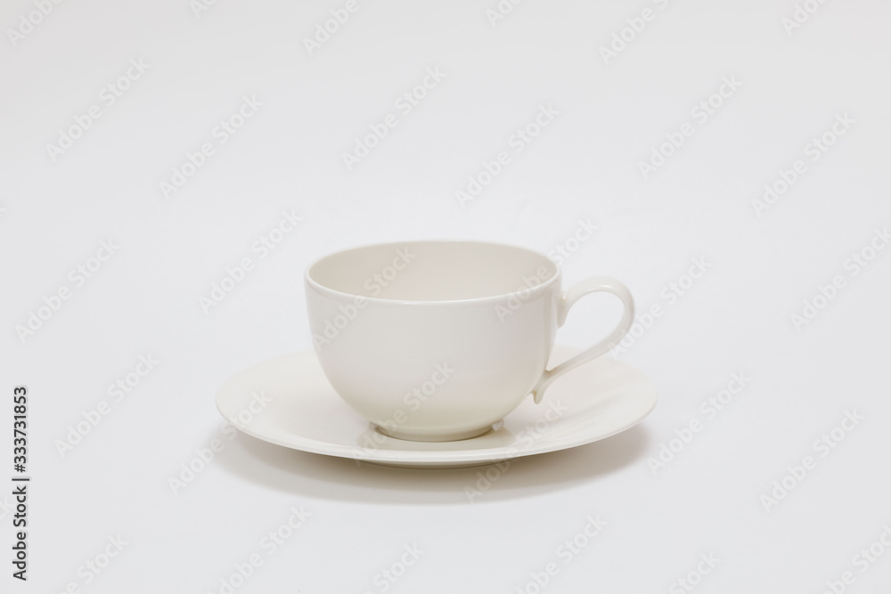 white cup for tea or coffee on a white background white cup for tea or coffee on a white background