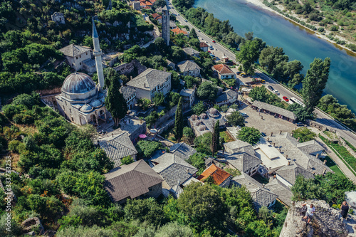 Aerial view from 14th century fortress on Pocitelj village in Capljina municipality with Mosque of Hajji Alija, Bosnia and Herzegovina