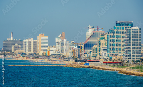 Aerial view from Abrasha park with hotels and residential skyscrapers situated by the sea in Tel Aviv, Israel