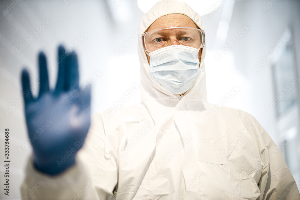 corona virus concept. male doctor showing stop sign corona virus concept. male doctor showing stop sign