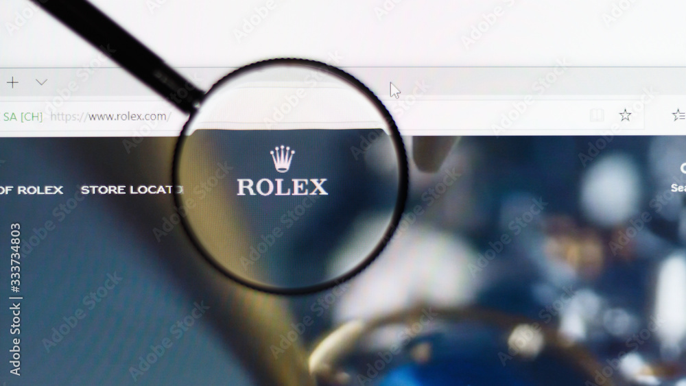 Foto de Roblox logo on the Roblox website seen through a magnifying glass  do Stock